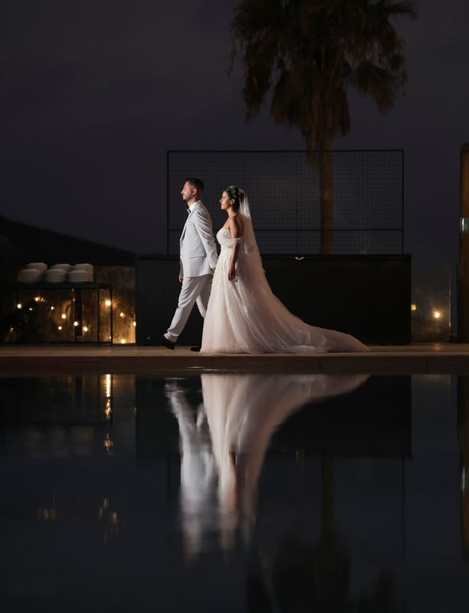 Elegant portrait in black at a wedding reception